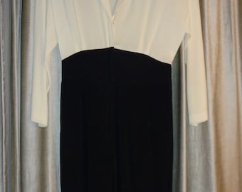 One Piece Pantsuit in Black and White in Near Mint Condition with fitted high waistline and black fringe trim finish on shoulders