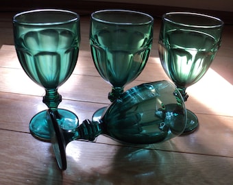 4 Vintage Dark Green Glass Ice Cream Sundae Carafes or water goblets in Mint Condition with a wonderful pressed, stamped, molded glass shape