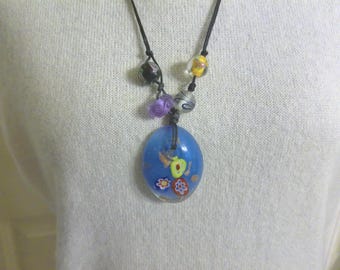 Beautiful Blue Glass Murano Millefiori filled pendant necklace with two glass flower beads and two swirled glass beads on a long string