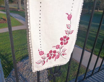 Vintage Hand Embroidered Cotton Table Runner or Tea Towel with a Warm Red Floral Design Display with hand sewn lace crochet edge trim
