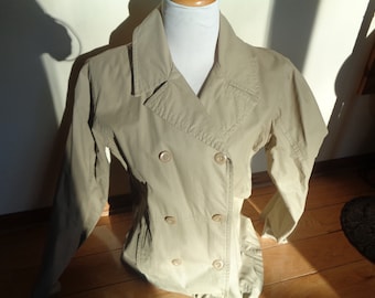 Vintage AEROPASTALE LABEL Size M Female Raincoat Jacket in Great Condition in a timeless classic trench coat style design that is waterproof