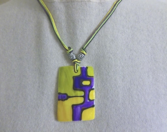 Vintage Handpainted Shell Necklace in a Modern Abstract Design Display with Mardi Gras Colors of Gold, Green and Purple in Mint Condition