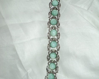 Vintage Mint Green Chalcedony Gemstone  Bracelet in ornate silver looking metal with butterfly filigree design with green peridots