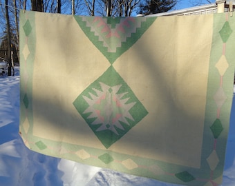Vintage Flat Weave Large Southwestern Style Woven Area Rug with Repeating Green and Pink Diamond patterns in Vintage Condition