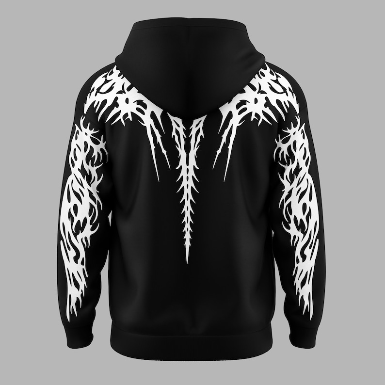 May include: A black hooded sweatshirt featuring a white, intricate, sharp-edged tribal graphic pattern that extends from the shoulders down the sleeves and runs vertically along the center of the back, creating a high-contrast design.