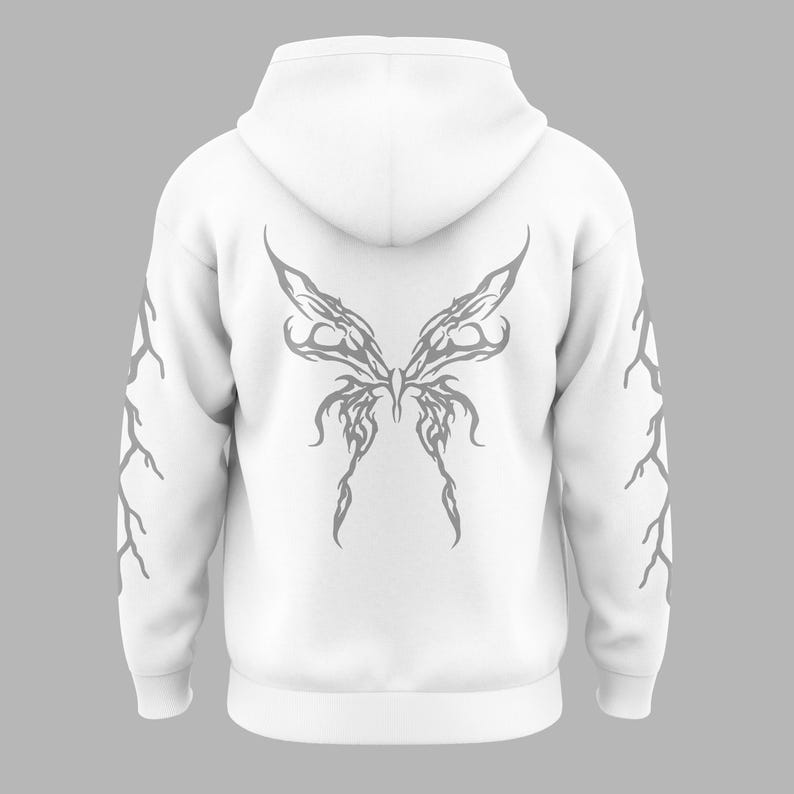 Puede incluir: Sudadera con capucha blanca con un dise&ntilde;o de alas de mariposa grises en la espalda y dise&ntilde;os grises en forma de rama en las mangas. La sudadera con capucha tiene una capucha y un ajuste relajado, adecuado para ropa casual. El dise&ntilde;o de mariposa es detallado y sim&eacute;trico.