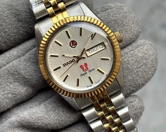 Reloj vintage Rado Purple Horse automático con esfera de lino plateado y fecha y día en dos tonos