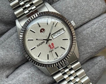 Reloj vintage Rado Purple Horse automático con esfera de lino plateado y fecha de día en acero inoxidable