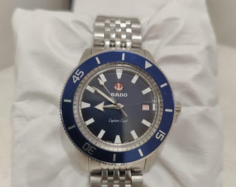 Reloj vintage Rado Captain Cook de acero inoxidable con esfera azul y fecha para hombre