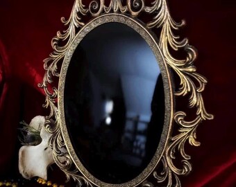 Espejo de adivinación dorado