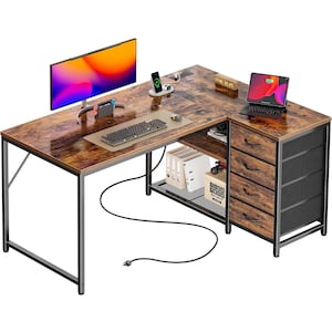 May include: L-shaped desk with a dark brown, wood-grain finish. The desk has a black metal frame and includes drawers, a shelf, and space for a computer monitor, keyboard, and laptop. A charging station and a digital clock are also visible.