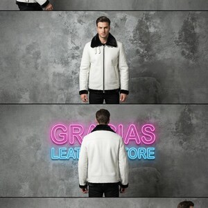 May include: White leather jacket with black trim and a black fur collar. The jacket has a zipper closure and a buckle detail. The image also shows the text "GRACIAS LEATHER STORE" in pink and blue neon.