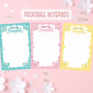 May include: Three rectangular printable notepads measuring 4 by 6 inches, featuring a scalloped white center and butterfly motifs. Each notepad displays the text Just My Thoughts at the top, with one teal, one pink, and one yellow design.