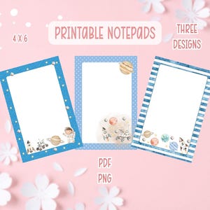 May include: Three printable notepads with space-themed designs. Each notepad has a white interior and a blue border with stars, polka dots, or stripes. The notepads are labeled "4 x 6" and "Printable Notepads". The image also includes the text "Three Designs", "PDF", and "PNG".