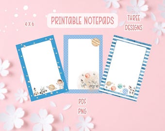 May include: Three printable notepads with space-themed designs. Each notepad has a white interior and a blue border with stars, polka dots, or stripes. The notepads are labeled "4 x 6" and "Printable Notepads". The image also includes the text "Three Designs", "PDF", and "PNG".