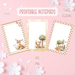 May include: Three printable notepads with fox illustrations. Each notepad features a different design: striped border, tree and fox, and a gingham border. The notepads are 4 x 6 inches and include PDF and PNG formats.