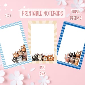 Puede incluir: Tres blocs de notas imprimibles con ilustraciones de gatos. Cada bloc de notas tiene un interior blanco y un borde decorativo en azul, beige o rayas azules. Los blocs de notas están etiquetados como "Printable Notepads" y miden 10 x 15 cm.