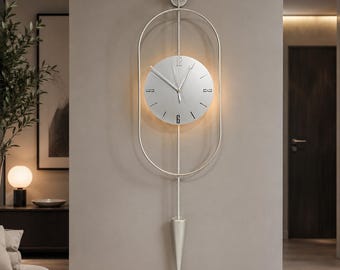 Large Metal Wall Clock with Pendulum, Battery Operated LED Backlit Modern Wall Art, Silent Scandinavian Decor, Silver Oval Luxury Clock