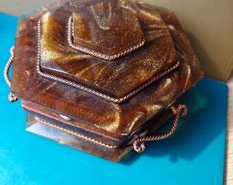 Vintage jewellery box, warm Amber colour.