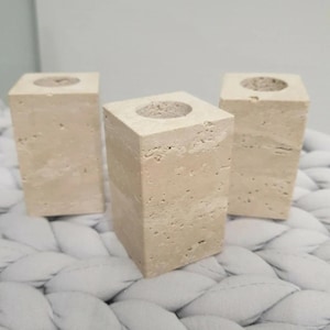 travertine candlestick crafted from natural stone in a clean rectangular shape
