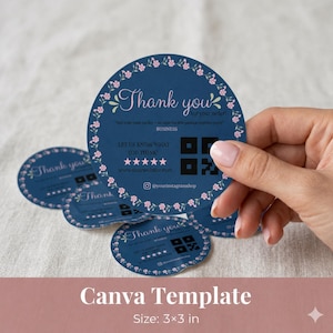 May include: Navy blue round cards with a floral border and the words "Thank you" in white script. The cards include a QR code, a website address, and social media handle. The Canva template is 3x3 inches.