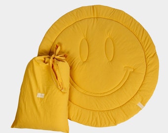 Round play mat for babies with a happy smiley face - available in different colors
