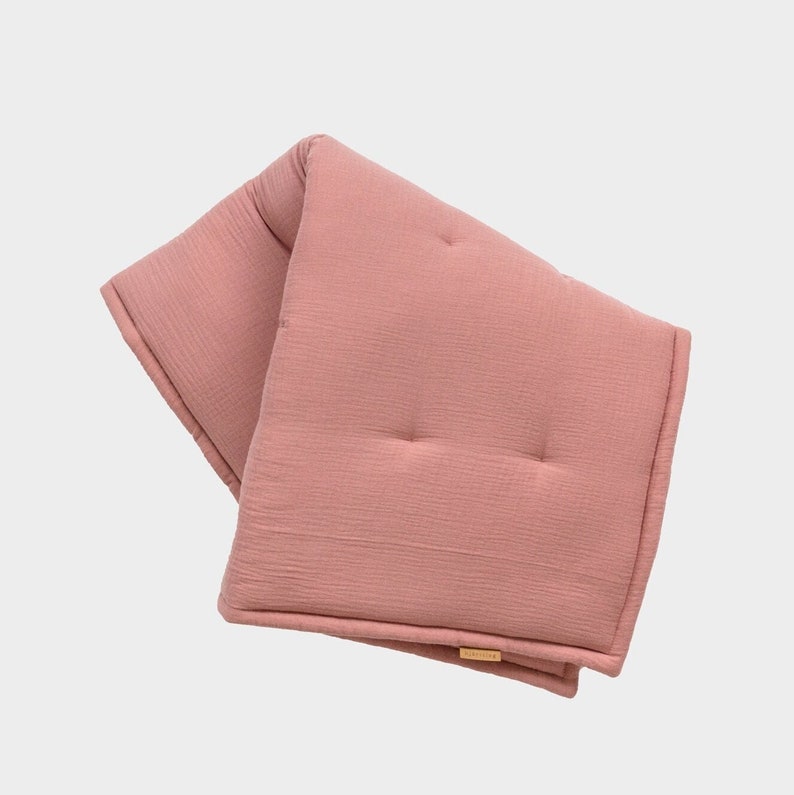 Soft muslin crawling blanket for babies from hjärtslag design available in different colors fuchsia col. 619