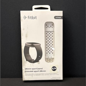 May include: A Fitbit watch strap and a white sport strap are shown on a white box. The box features the Fitbit logo and the Google logo. The text "24mm sport band bracelet sport 24mm" is printed on the box.