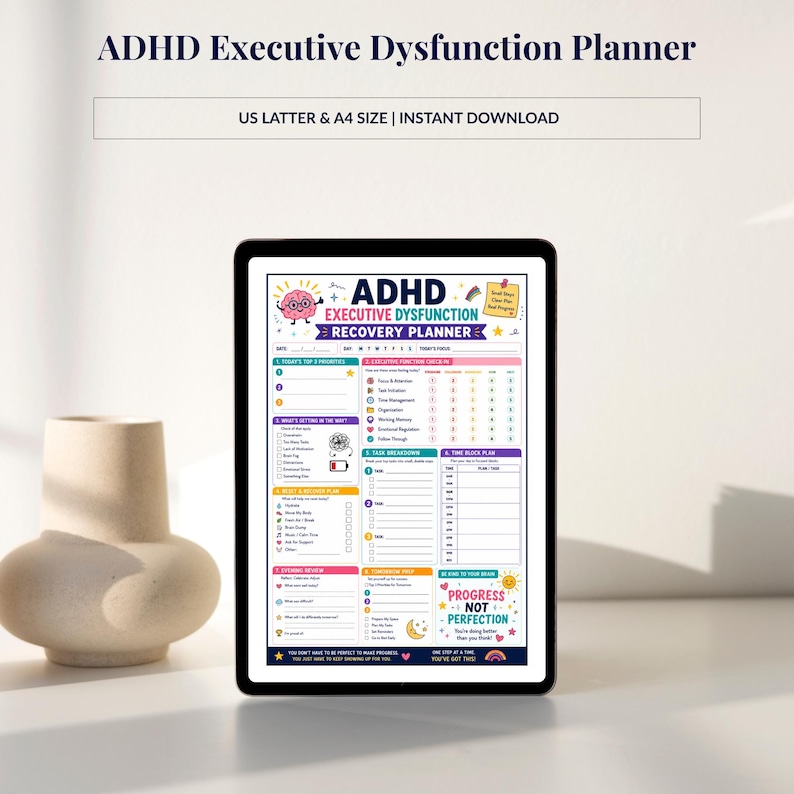 May include: A digital planner on a tablet with the text "ADHD Executive Dysfunction Planner". The planner has sections for daily tasks, executive function checklist, and a task breakdown. The planner is US Letter & A4 size.