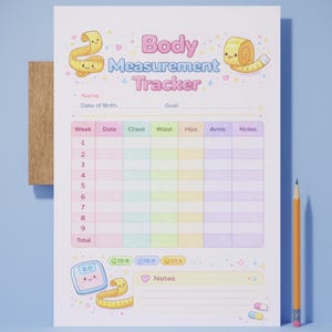 May include: A Body Measurement Tracker sheet with a pastel rainbow color scheme. The sheet includes sections for recording chest, waist, hips, and arm measurements. Cute cartoon tape measure and scale graphics are included. A pencil is next to the sheet.