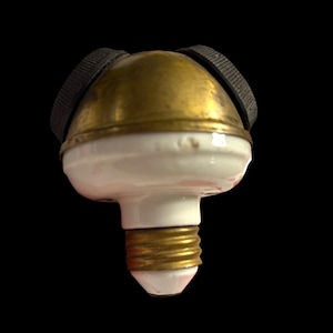 May include: A set of three ceramic mugs with a speckled, matte finish. The mugs are in shades of cream, light gray, and dark gray. Each mug has a simple, minimalist design, perfect for coffee or tea. The mugs are stacked on top of each other.