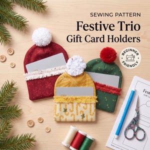 May include: Three fabric gift card holders shaped like winter hats with pom-poms. One is red with snowflakes, one is yellow with candy canes, and one is green with holly. Text reads: SEWING PATTERN Festive Trio Gift Card Holders Beginner Friendly.