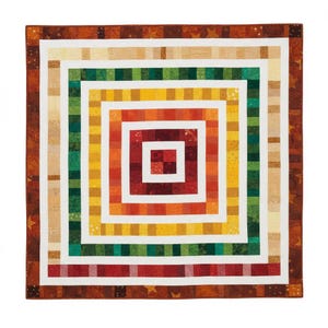 May include: A colorful, square quilt with a concentric design. The quilt features a series of squares in shades of red, orange, yellow, green, and tan, separated by white borders. The outer border is a dark brown with star patterns.