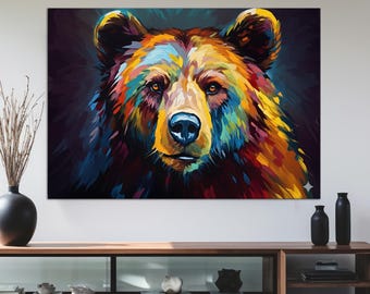 May include: A vibrant, colorful painting of a bear's face. The artwork features a close-up of the bear's head, with a focus on its eyes and nose. The bear's fur is rendered in a mix of bright colors, including yellow, orange, blue, and purple. The painting is displayed above a wooden cabinet.