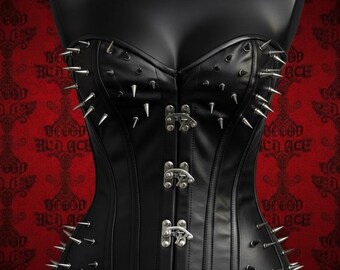 Corsetto in pelle nera con borchie, bustier gotico punk, corsetto modellante senza spalline, top alternativo da discoteca.