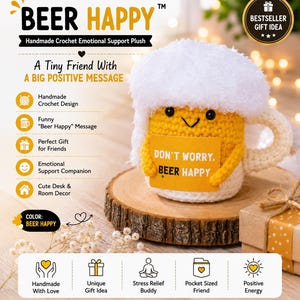May include: A handmade crochet plush shaped like a beer mug with yellow yarn, a white fuzzy foam top, and a handle. It features black bead eyes, a stitched smile, and holds a yellow sign that reads "DON'T WORRY, BEER HAPPY" in black text.
