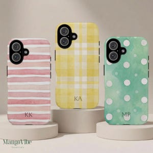 May include: A white ceramic mug with a black handle and the text "But First, Coffee" in a bold, black font. The mug is set against a blurred background, highlighting its clean design.