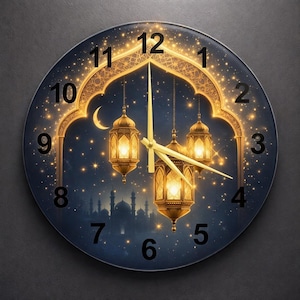May include: Round wall clock with a dark blue face featuring a gold archway, hanging lanterns, and a crescent moon. The clock hands are gold, and the numbers are in a gold font. The background depicts a silhouette of a mosque and stars.
