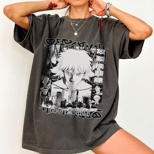 May include: A set of three ceramic mugs with a speckled, matte finish. The mugs are in shades of cream, light gray, and dark gray. Each mug has a simple, minimalist design, perfect for coffee or tea.