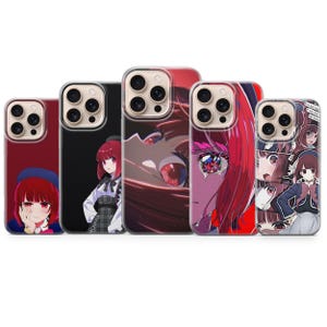 May include: Five phone cases with anime-style illustrations. The cases feature images of a girl with red hair and various outfits and expressions. The cases are in different colours, including red, black, and clear.