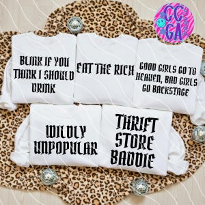 May include: A set of three ceramic mugs with a speckled, matte finish in cream, light grey, and dark grey. Each mug has a simple, minimalist design, suitable for coffee or tea.