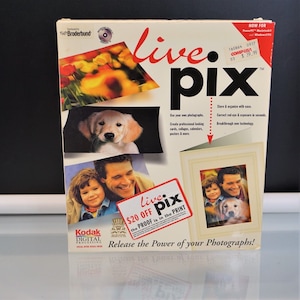 May include: A boxed copy of "live pix" software. The box features images of a golden retriever puppy, a family, and flowers. Text on the box includes "Use your own photographs" and "Release the Power of your Photographs!"