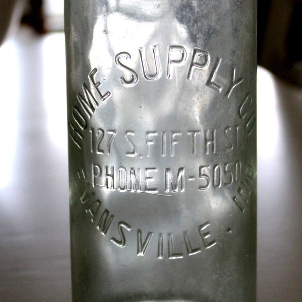 vintage green bottle embossed the HOME SUPPLY CO.