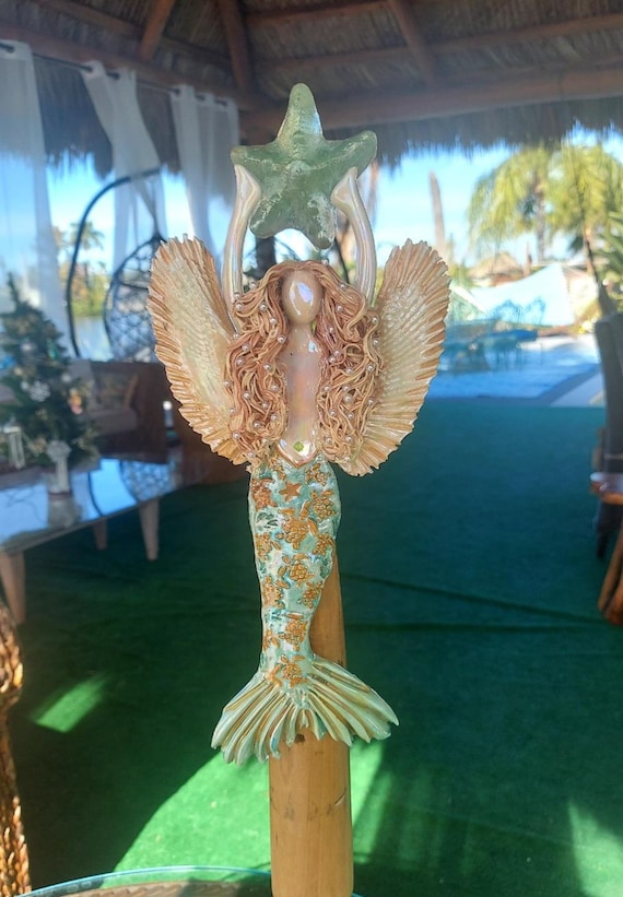 Golden haired Angel Mermaid tree topper.