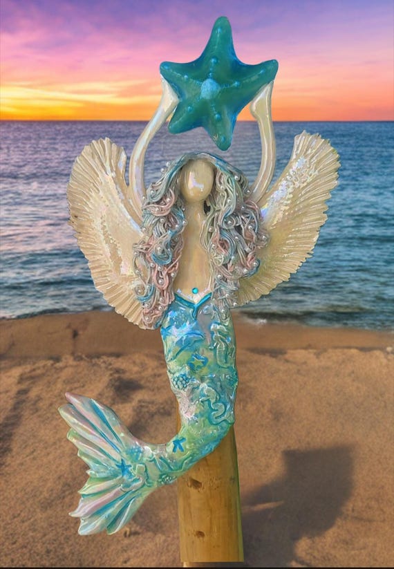 Angel, rainbow Mermaid Tree topper with turtles, dolphins and se creatures.