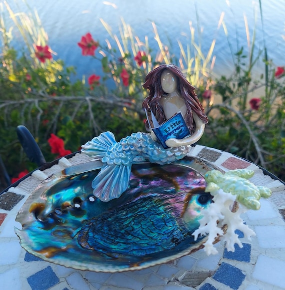 Mermaid and sea turtle sitting upon an Abalone shell