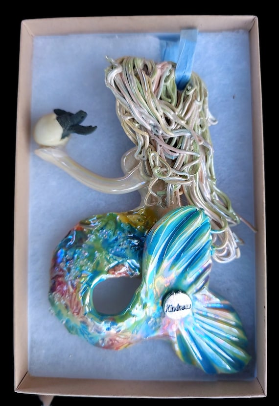 Mermaid Ornament holding a sea turtle hatchling