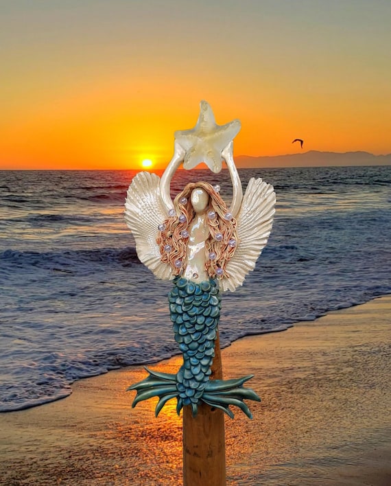 Merangel tree topper, ready to swim your way today