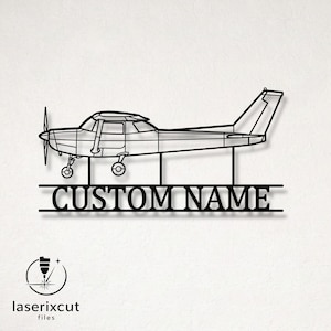 May include: A black metal wall art piece featuring a side profile silhouette of a single-engine propeller airplane. Below the aircraft, two horizontal lines frame the text CUSTOM NAME in a bold, sans-serif font, connected by vertical supports.
