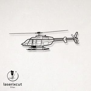 May include: Black metal helicopter wall art. The helicopter features a detailed outline of the aircraft, including the rotor blades, tail rotor, and windows. The logo "laserixcut files" is in the lower left corner.